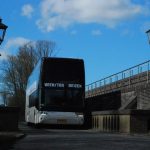 Touringcabedrijf Assen met de dubbeldekker voorkant